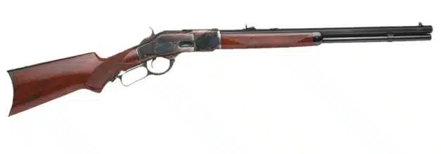 Classic lever-action 1873 rifle with polished metal and wooden stock, perfect for collectors.