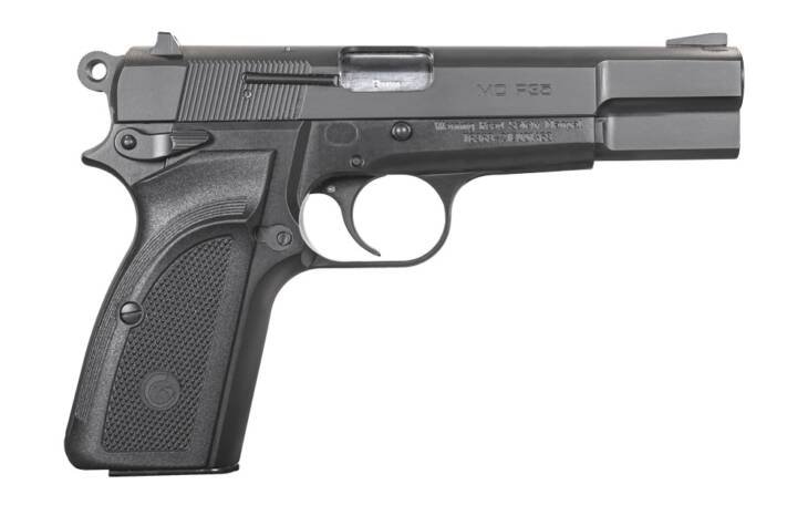 Sleek semi-automatic pistol with ergonomic grip, designed for comfort and versatile shooting performance.