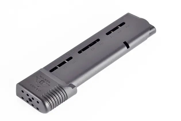 Durable black metal pistol magazine with ergonomic grip and clear round indicators for performance.