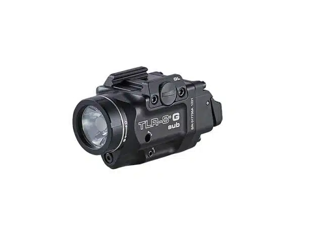 Tactical flashlight and laser sight combo for firearms, ideal for law enforcement and home defense.