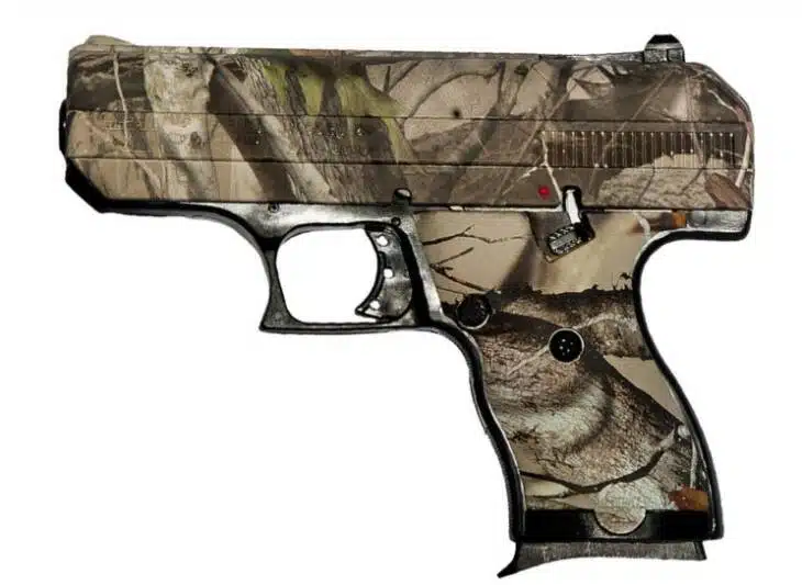 Compact camouflage handgun designed for outdoor use, combining style, precision, and ergonomic control.