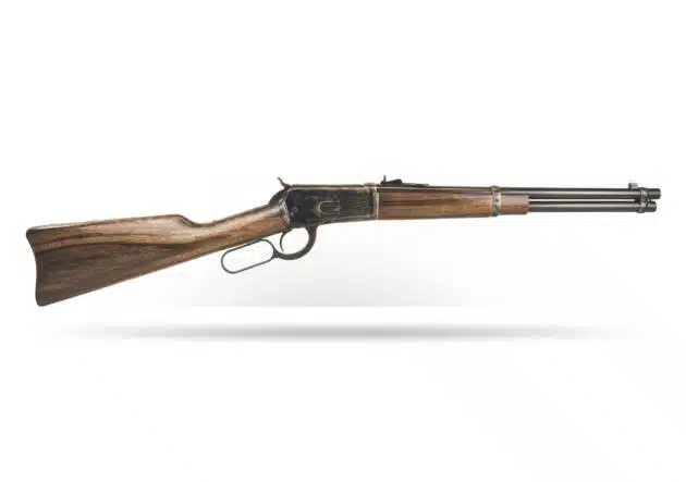 Elegant lever-action rifle with blued barrel and polished wood stock, perfect for collectors and hunters.