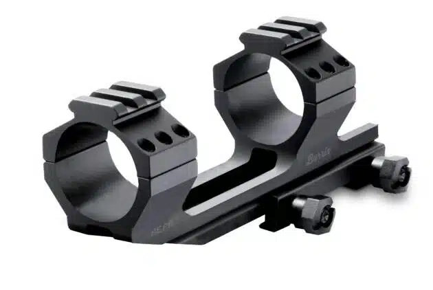 Durable dual-ring rifle scope mount with matte finish for precision and stability in shooting.