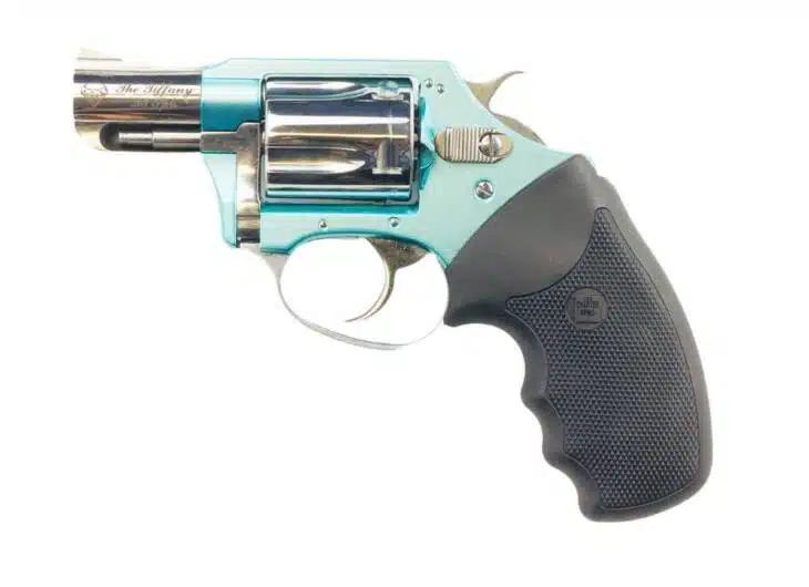Sleek silver revolver with light blue accents, ergonomic grip, perfect for self-defense.