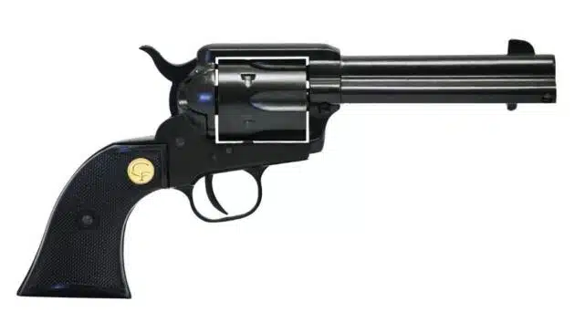 Elegant black revolver with gold emblem, showcasing classic Western design and craftsmanship.