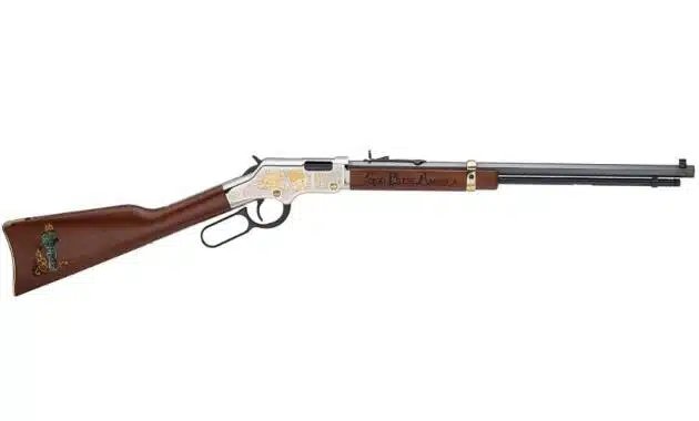 Classic lever-action rifle with ornate engravings and a beautiful wooden stock, perfect for collectors.