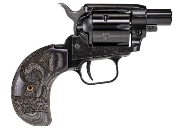 Elegant black compact revolver with intricate design, perfect for concealed carry and collectors.