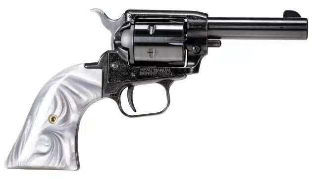 Classic Western revolver with polished black finish, pearlescent grip, and elegant gold accents.