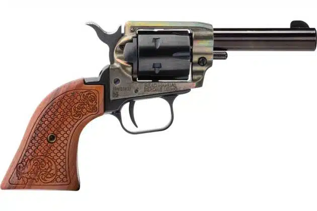 Classic vintage revolver with polished wood grip and elegant metallic finish for collectors.