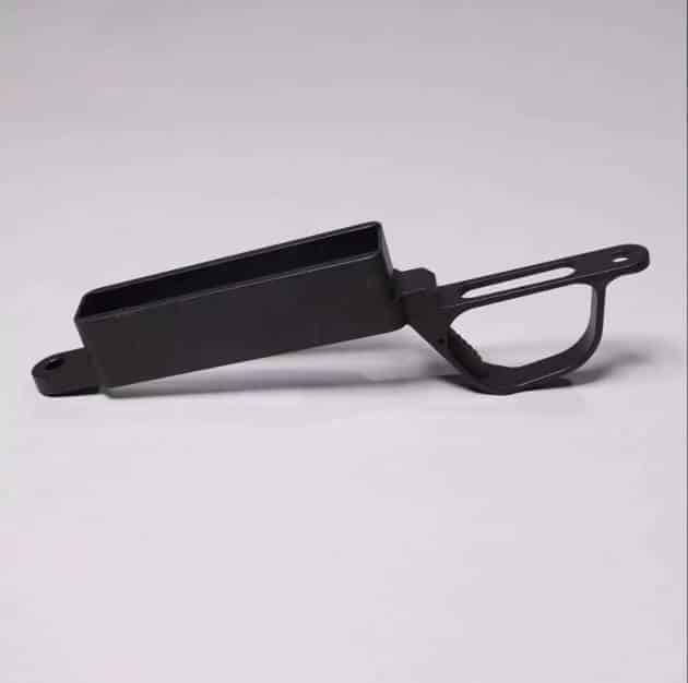 Ergonomic black metal tool with a curved handle, designed for precision and optimal grip.