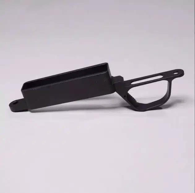 Ergonomic black metal tool with a curved handle, designed for precision and optimal grip.