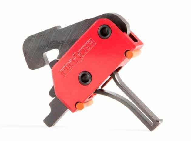 Ergonomic red clamp tool for secure gripping in industrial applications and demanding environments.