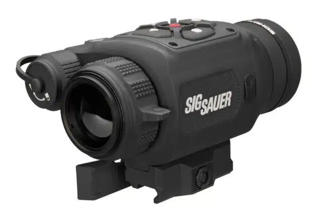 Compact SIG SAUER Night Vision Scope with adjustable focus for superior low-light visibility and reliability.