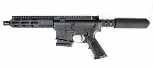 Versatile AR-15 Tactical Rifle with suppressor, modular features, and ergonomic grip for enhanced performance.