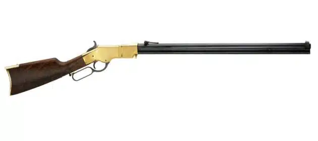 Elegant vintage lever-action rifle with polished wood stock and brass receiver, perfect for collectors.