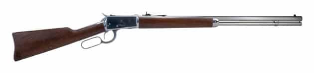 Classic lever-action rifle showcasing polished metal and rich hardwood, combining elegance and reliability.