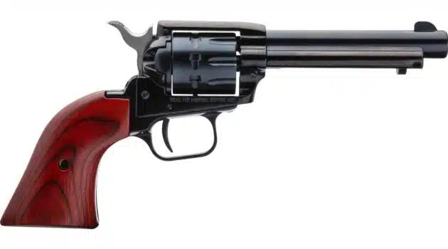 Sleek vintage revolver with polished metal finish and elegant wood grip, perfect for collectors.