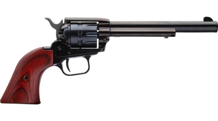 Classic blued revolver with wooden grip, featuring vintage design and accurate elongated barrel.