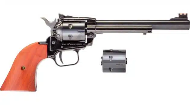 Classic blued revolver with wooden grip, detachable cylinder, perfect for collectors and enthusiasts.