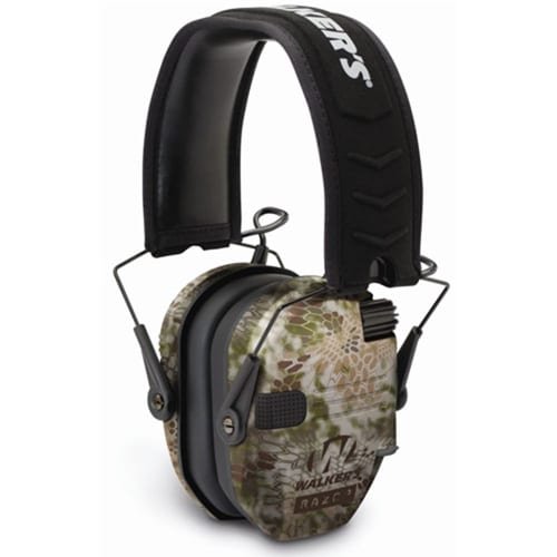 Camouflage earmuffs for hunting providing noise reduction and audio clarity in outdoor environments.