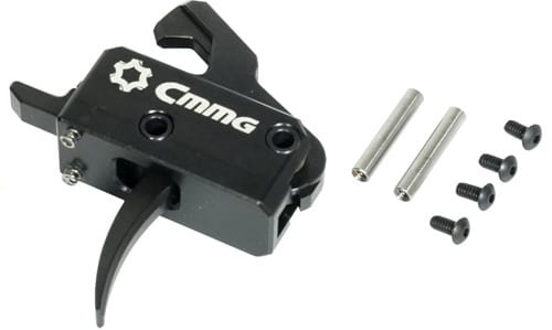 CMMG ergonomic trigger assembly with S-shape design and essential mounting hardware for firearm upgrades.