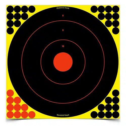 Vibrant shooting target with red bullseye and yellow border for enhanced visibility and accuracy practice.