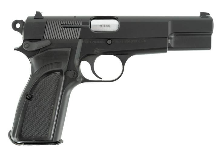 Sleek semi-automatic pistol with textured grip, matte black finish, and essential safety features.