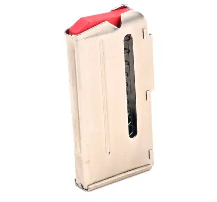 Sleek steel magazine with red follower and transparent window for quick round visibility.