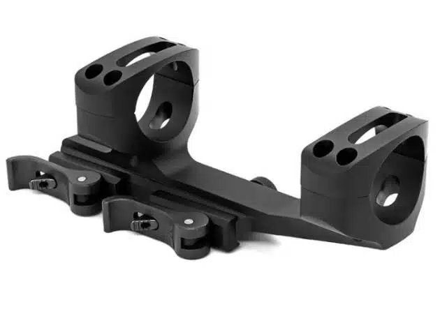 Durable modular optics mount for firearms, ensuring precision, versatility, and easy attachment for shooters.