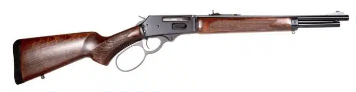 Classic lever-action rifle with polished metal and elegant wooden stock for hunting and collecting.