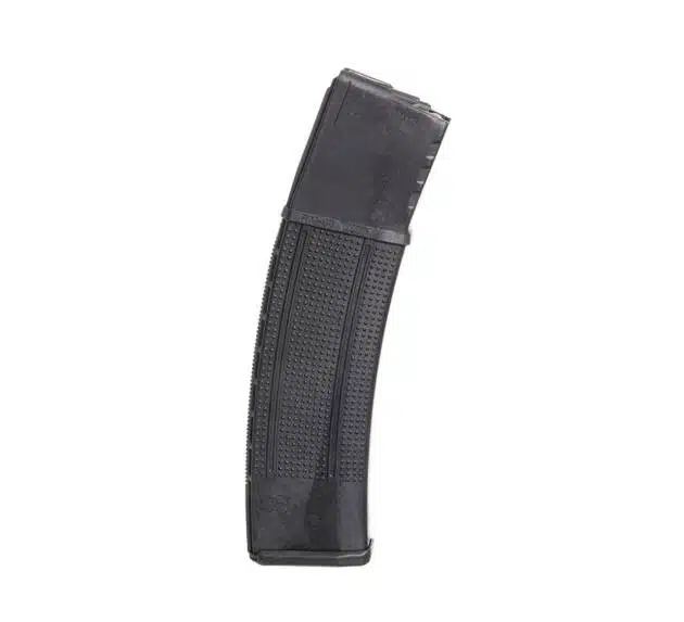 Durable tactical firearm magazine with textured grip for reliable performance in any environment.