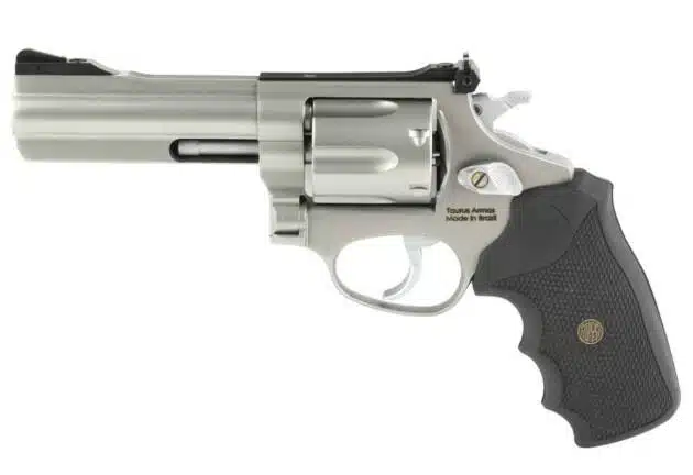 Polished stainless steel revolver with ergonomic grip for superior control and precision shooting.