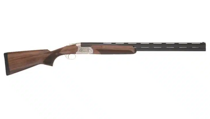 Elegant side-by-side shotgun with matte black barrel and polished walnut stock, ideal for collectors.