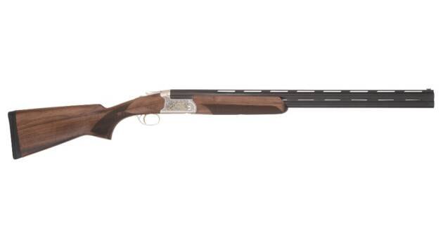 Elegant over-and-under shotgun with walnut stock, perfect for clay shooting and bird hunting.