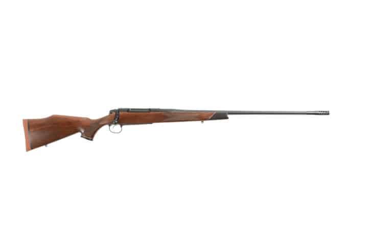 Custom wood stock rifle showcasing precision craftsmanship and elegant design for collectors and enthusiasts.