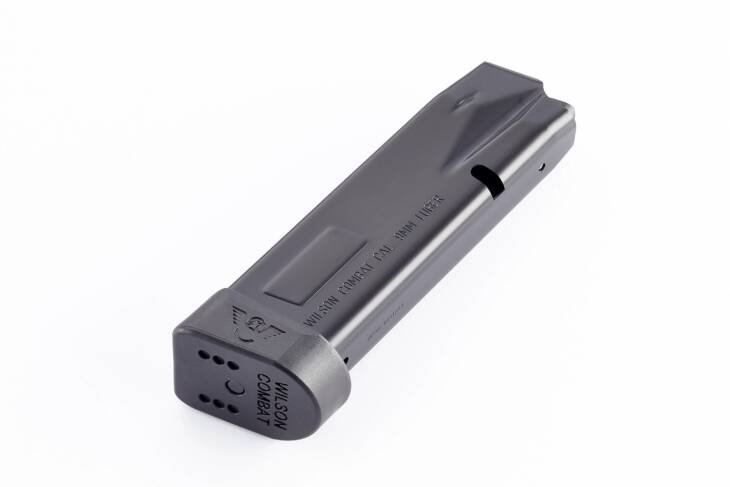 Sleek black firearm magazine with matte finish and witness hole for reliable performance.