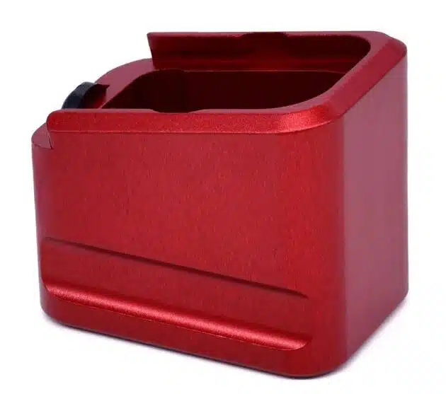 Sleek red aluminum accessory with grip, perfect for organizing gadgets and automotive essentials.