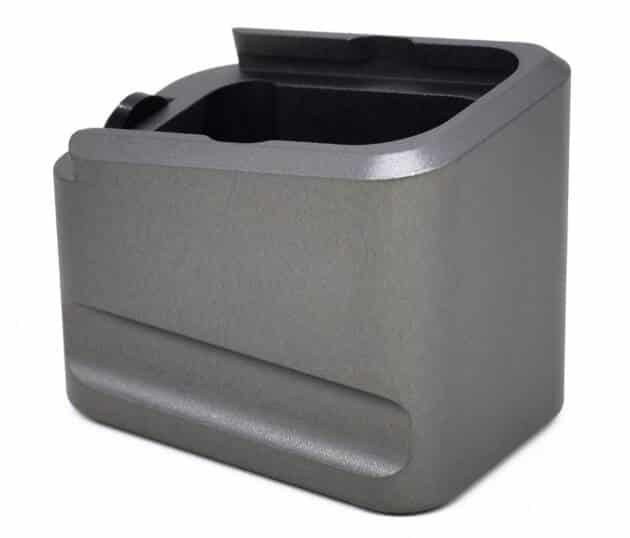 Stylish gray desk organizer with pen holder for a modern, minimalist workspace.