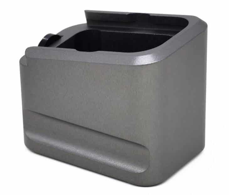 Stylish gray desk organizer with pen holder for a modern, minimalist workspace.