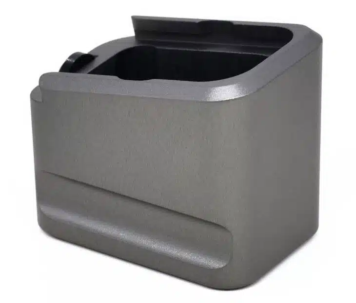 Stylish gray desk organizer with pen holder for a modern, minimalist workspace.