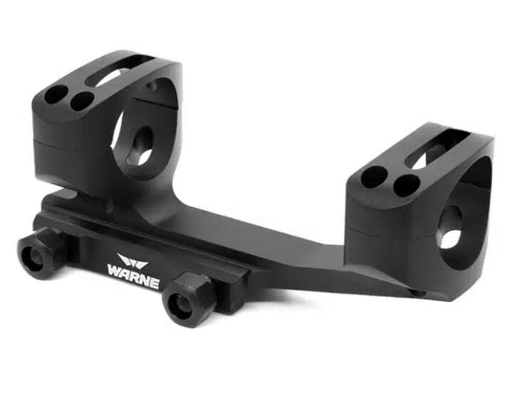 Durable Warne scope mount with matte black finish for stable, precise shooting on various firearms.