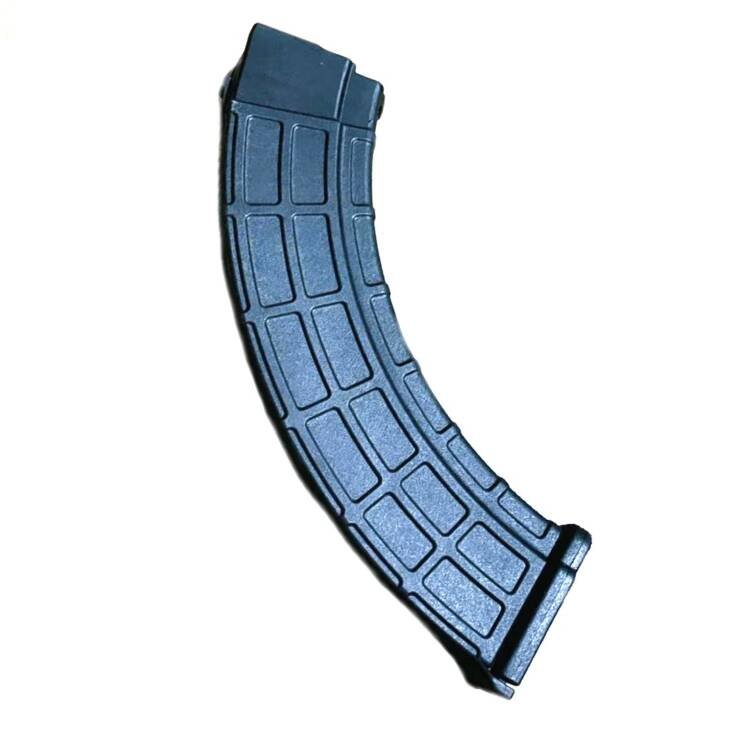 High-capacity curved black firearm magazine for reliable performance and smooth ammunition feeding.