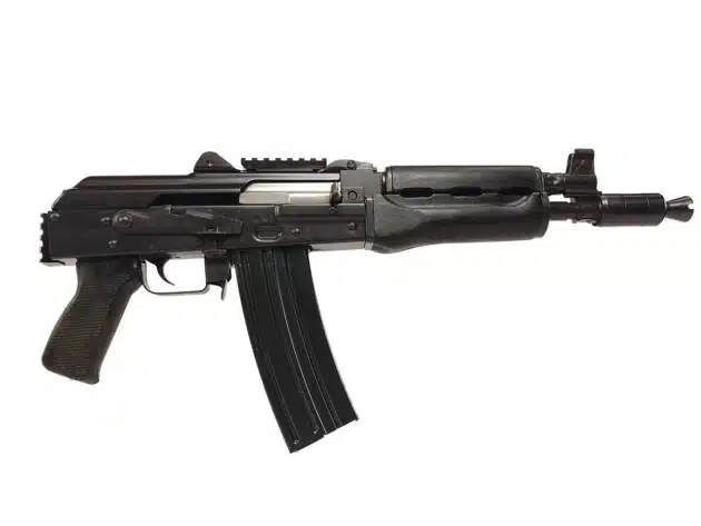 Modern black assault rifle with tactical accessories, durable polymer build, and high-capacity magazine.