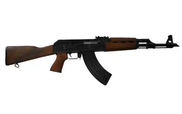 Iconic AK-47 rifle with wooden stock and curved magazine, combining reliability and historical significance.