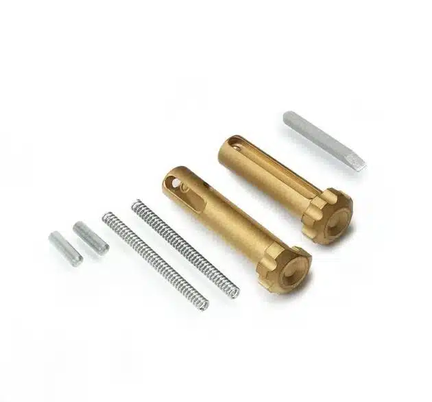Golden cylindrical components with springs and pins for reliable mechanical assemblies and enhanced movement.
