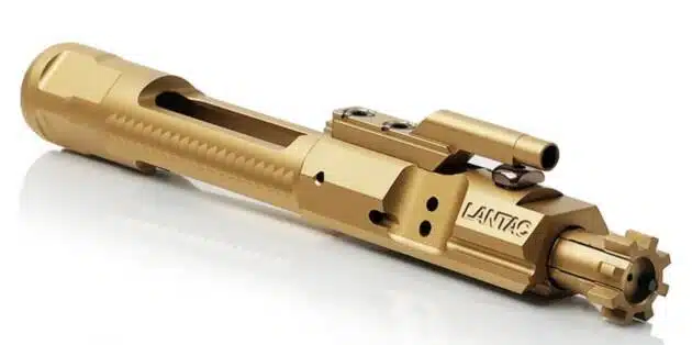 Premium gold bolt carrier group for AR-15, combining durability with stunning aesthetics.