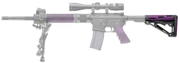 Custom AR-15 rifle with adjustable purple stock, bipod, and precision scope for enhanced shooting.
