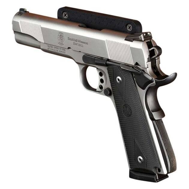 Sleek semi-automatic handgun with silver slide, textured grip, and tactical mounting rail for customization.