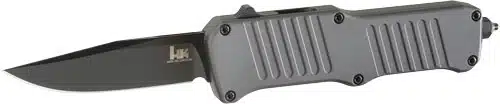 Durable tactical folding knife with ergonomic design, matte black blade, and secure grip for all tasks.