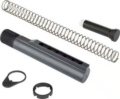 Firearm buffer tube assembly with spring and retaining plate for enhanced stability and performance.